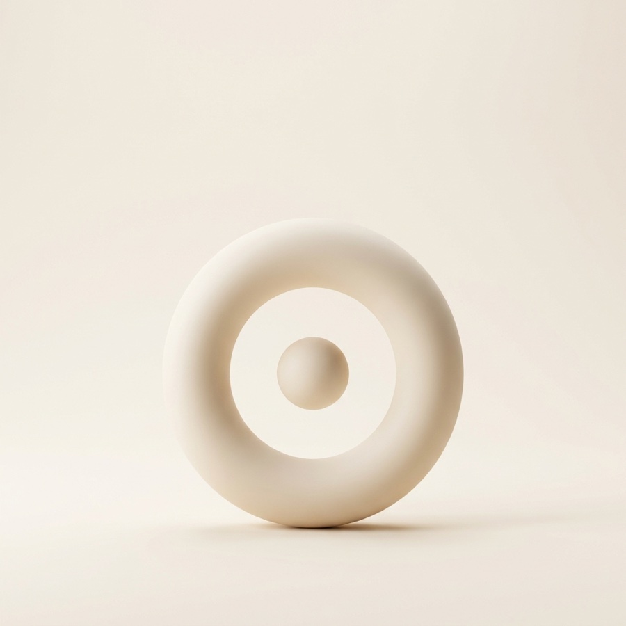 Porcelain ring with a sphere at its center